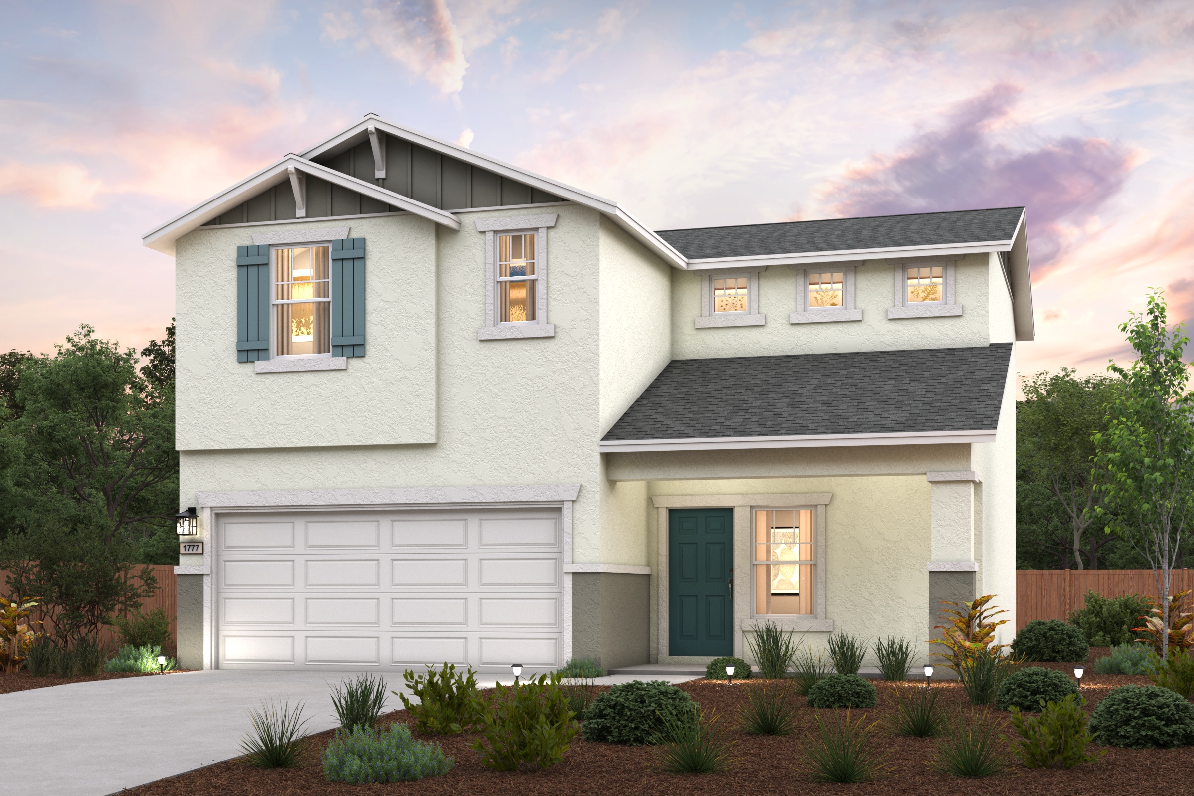 A white house with a garage.