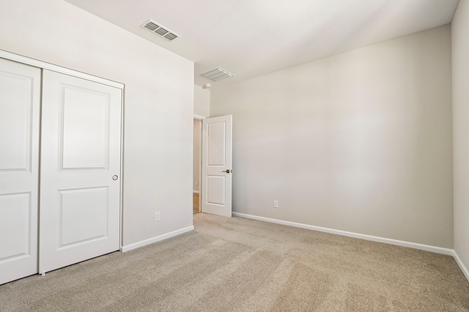 A room with white doors.