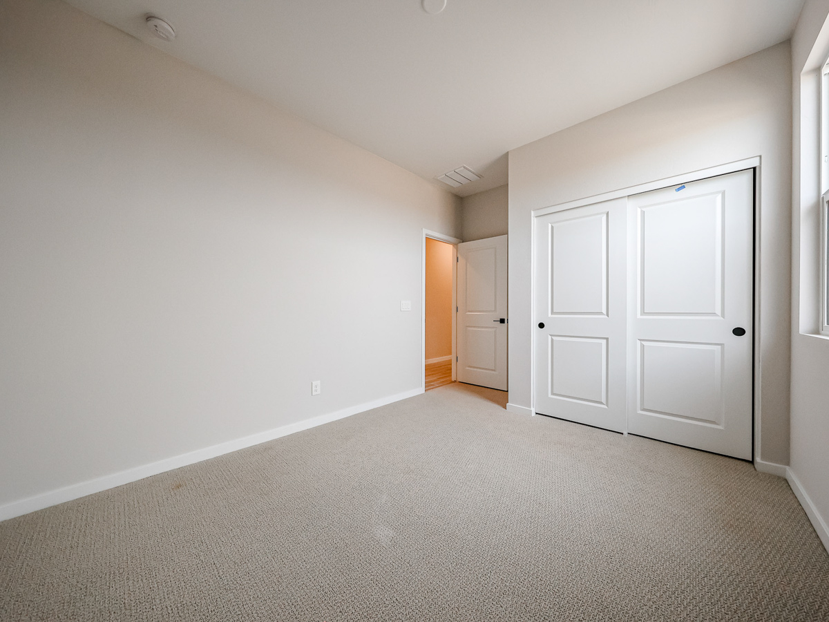 A room with white doors.