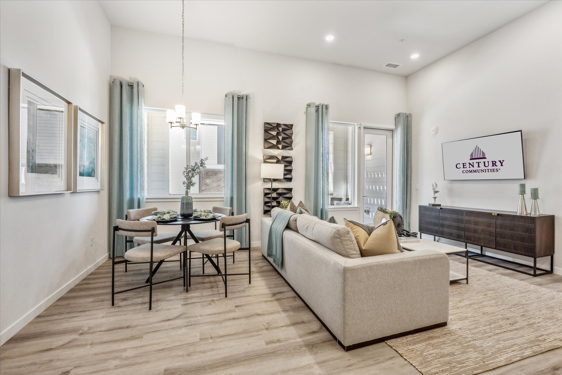 A living room with a couch and a table.