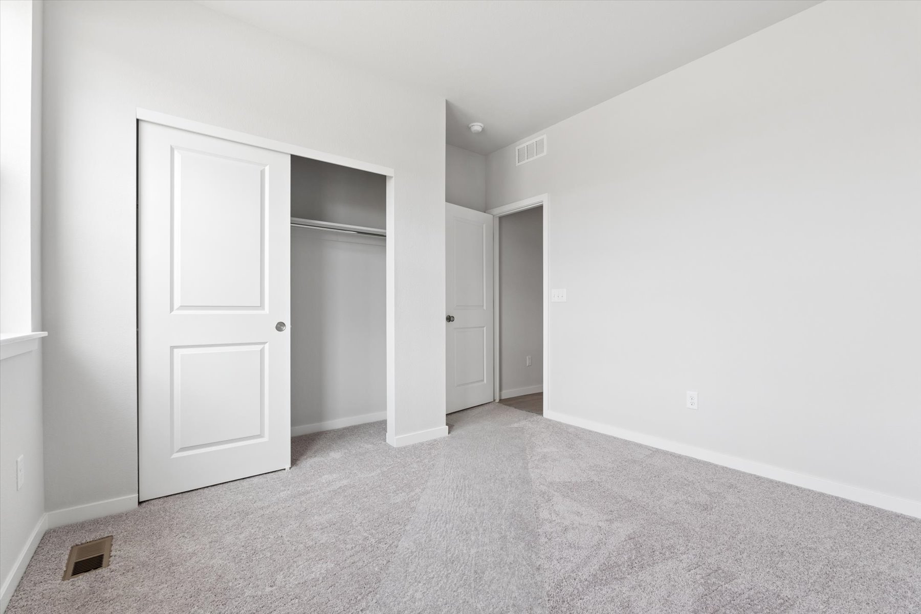 A room with white doors.