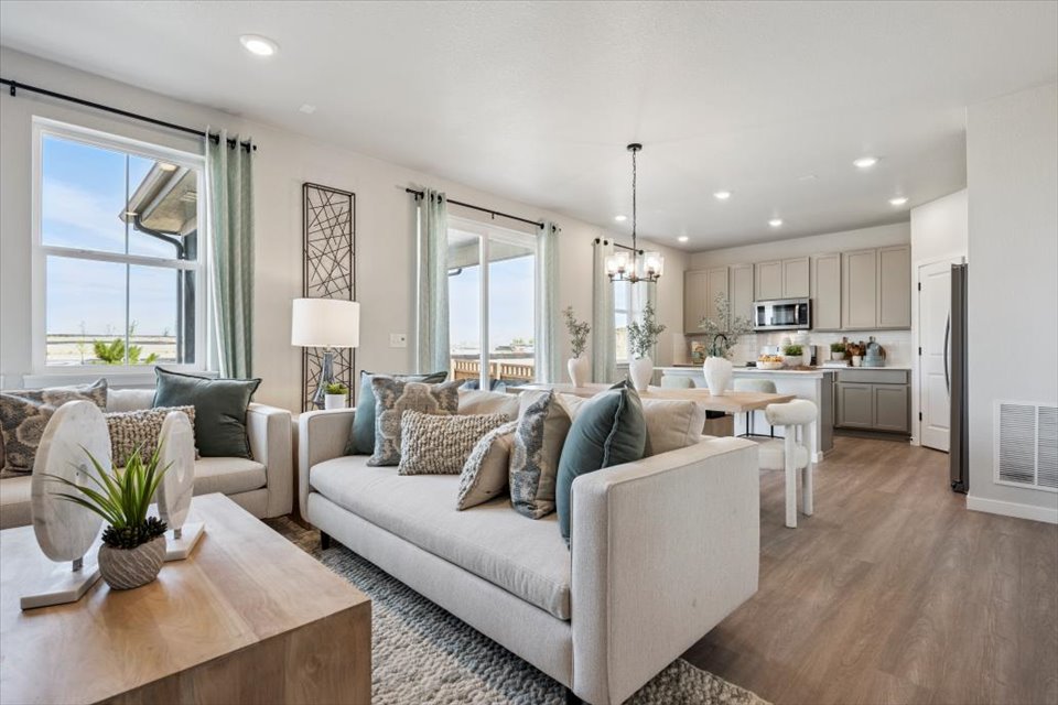 A living room with a couch and a table.