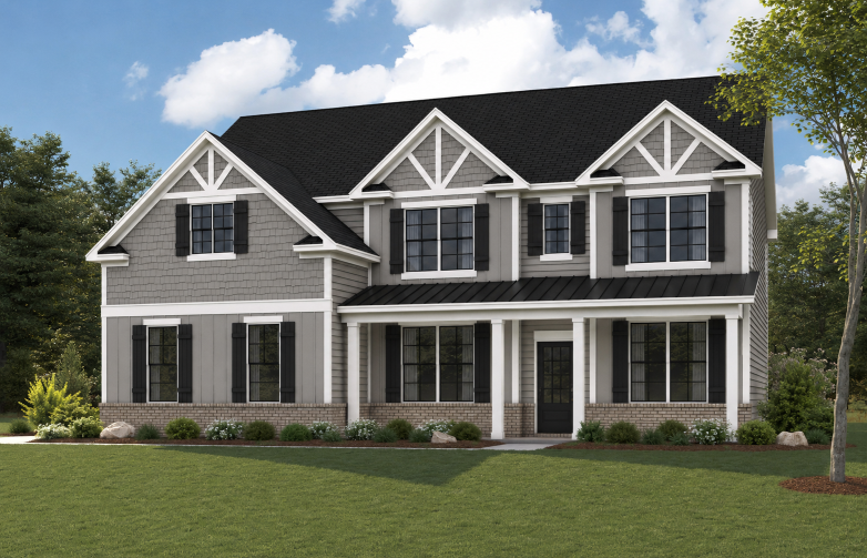A house with a lawn in front.