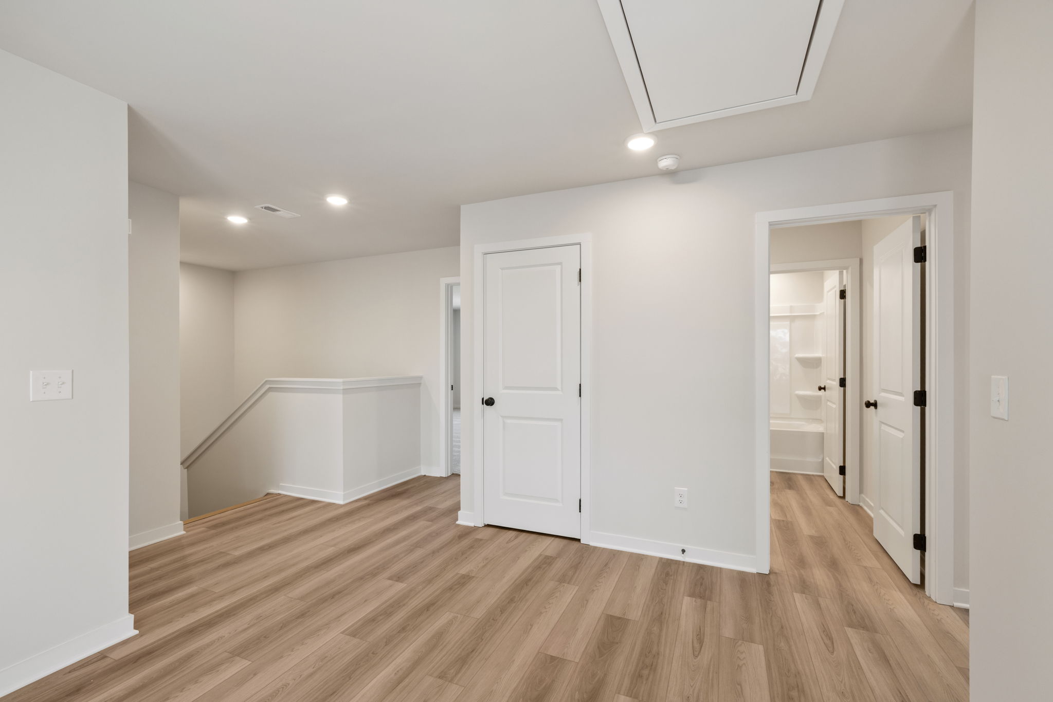 A room with white doors.