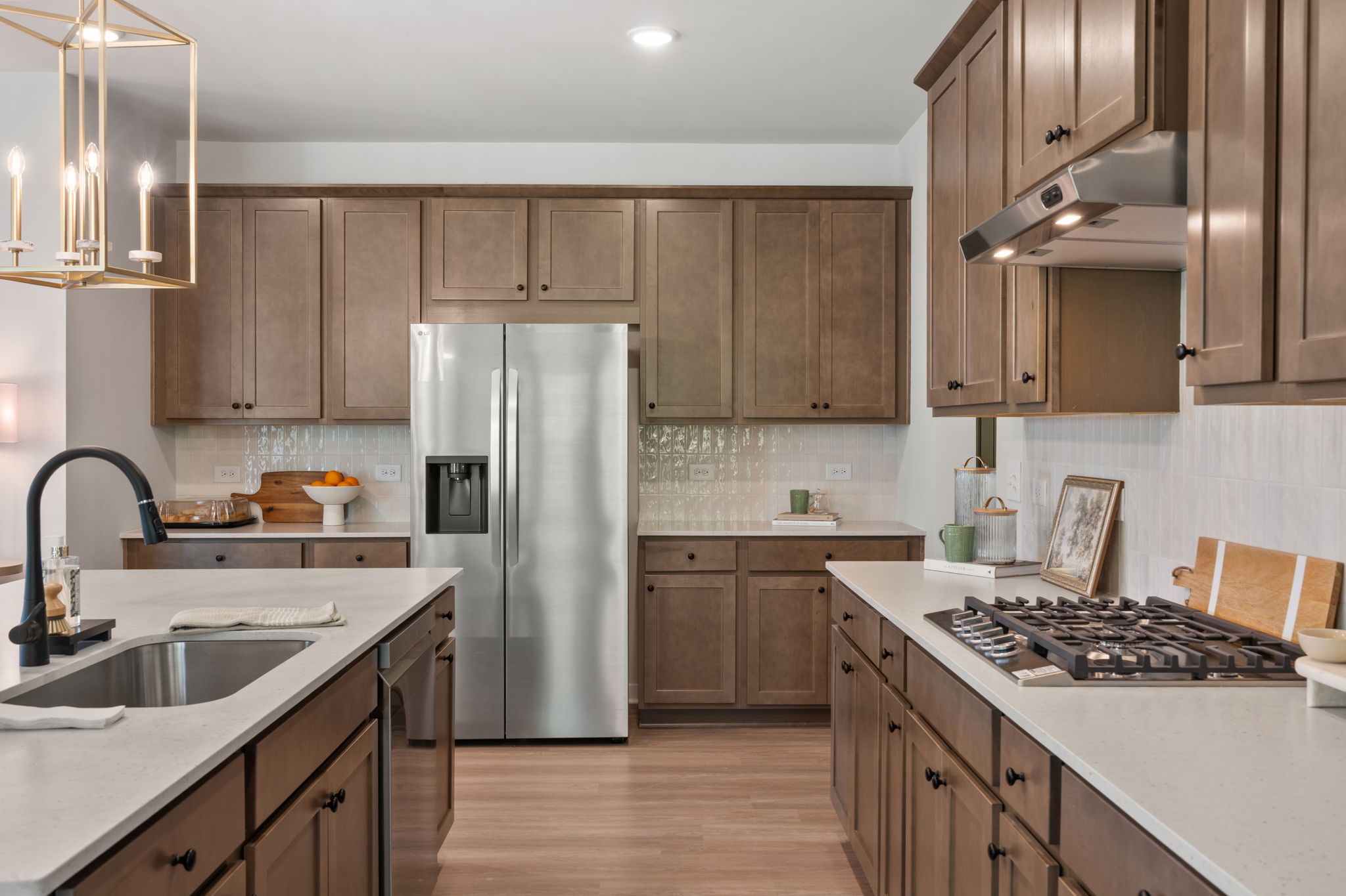 A kitchen with wooden cabinets.