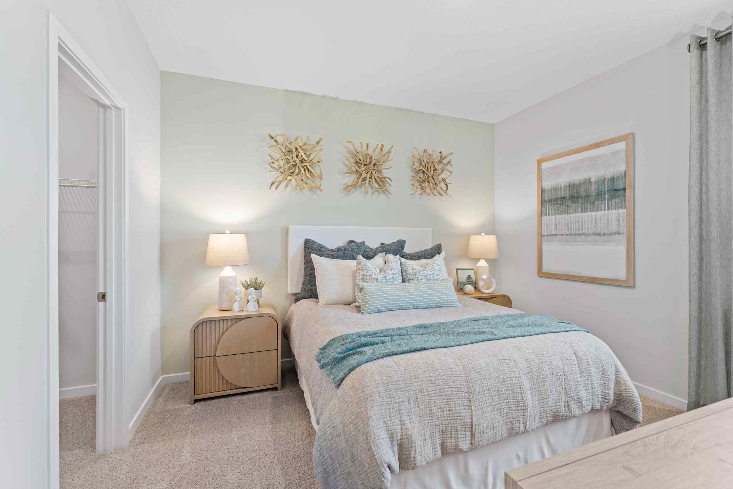 Laurel II Model Home Guest Room with Bed and Nightstands at Camden Woods in Kingsland, GA