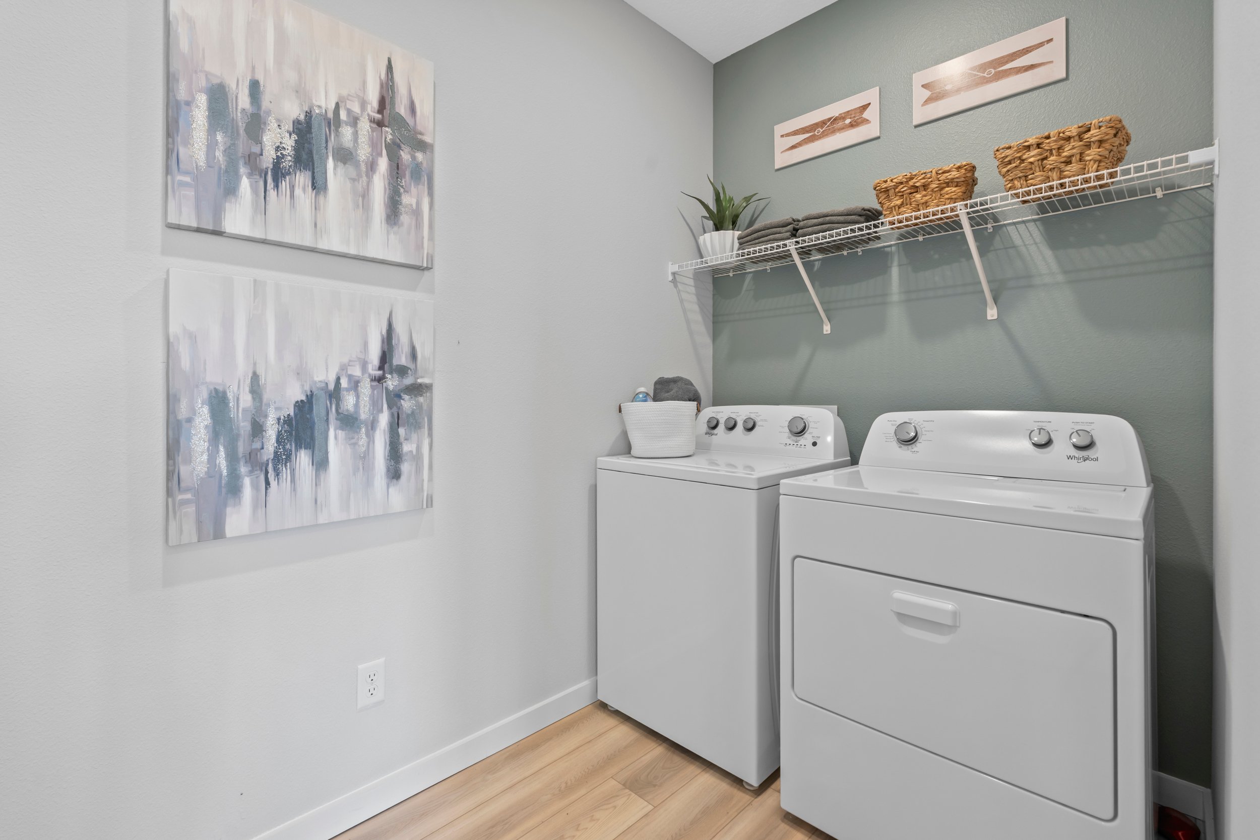 Coronado Model Home Laundry Room with Washer and Dryer at Reserve East in Flagler Beach
