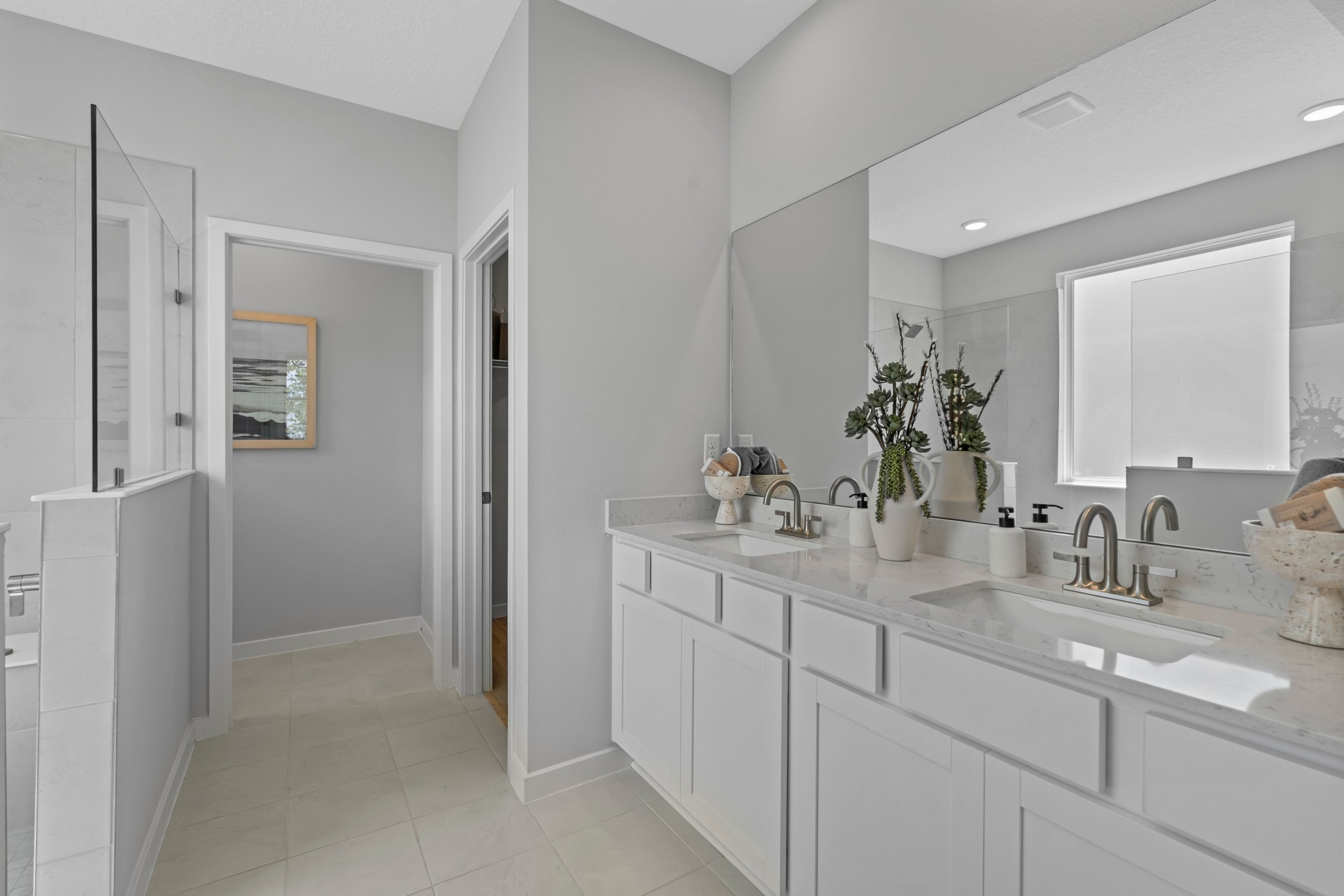 Coronado Model Home Primary Bathroom with Super Shower at Reserve East in Flagler Beach