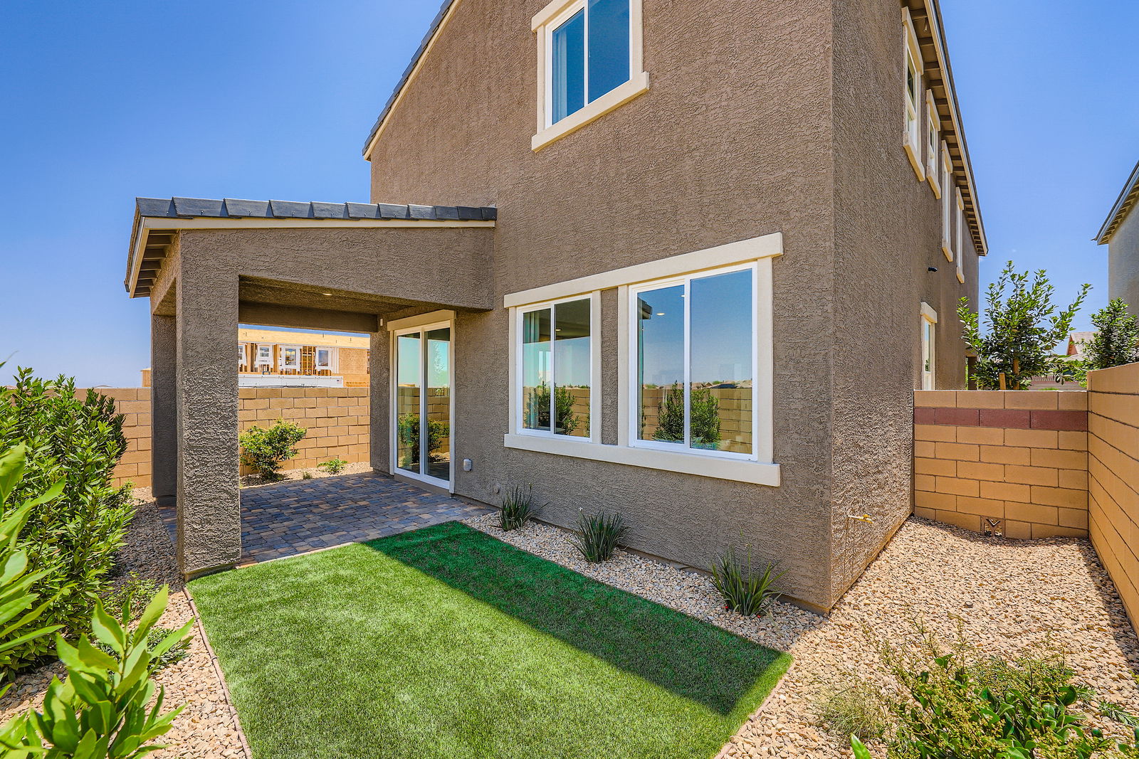 A house with a front yard.