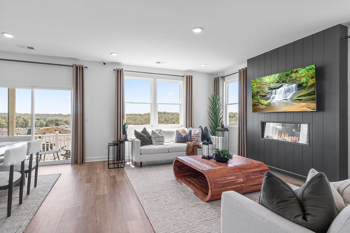 A living room with a fireplace.