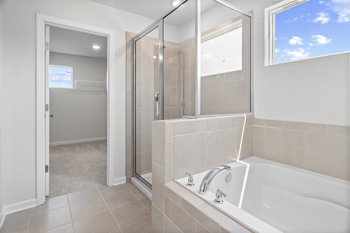 A bathroom with a glass shower.