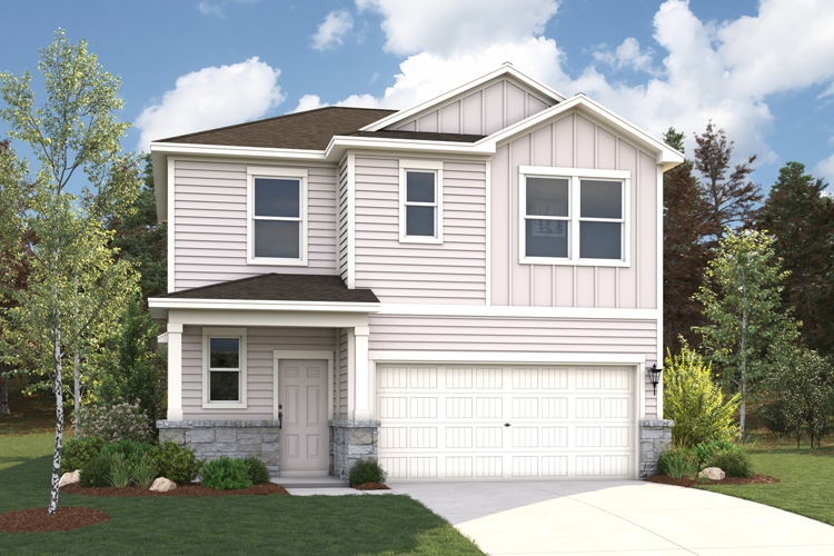 A white house with a driveway.