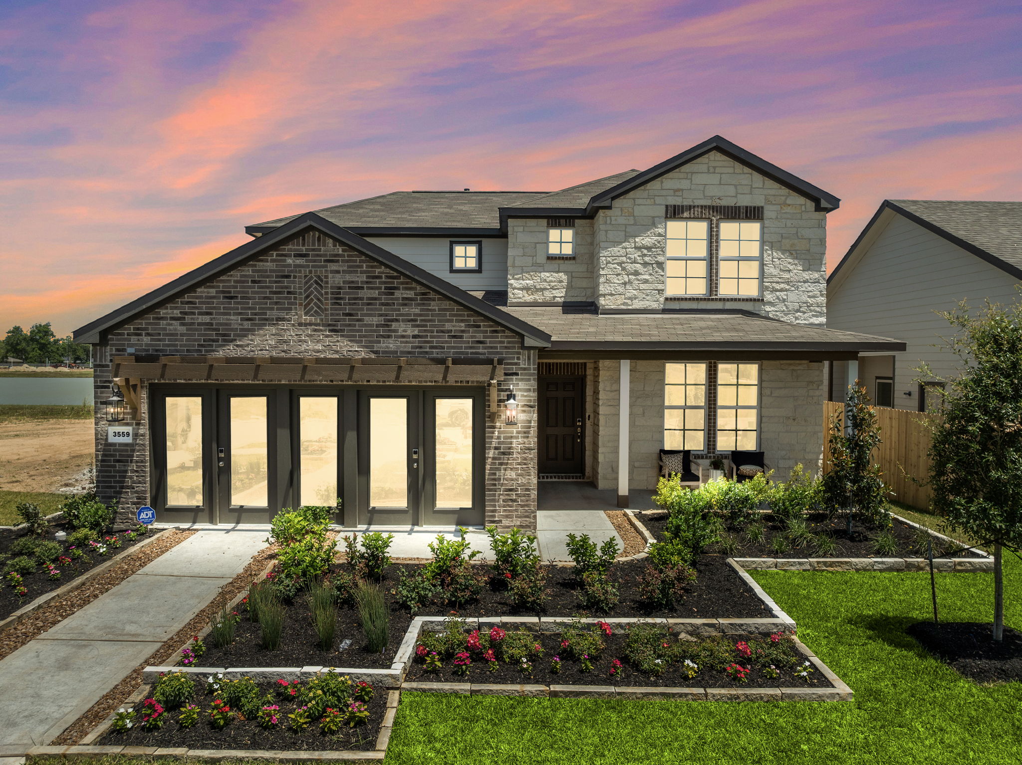 A house with a large front yard.