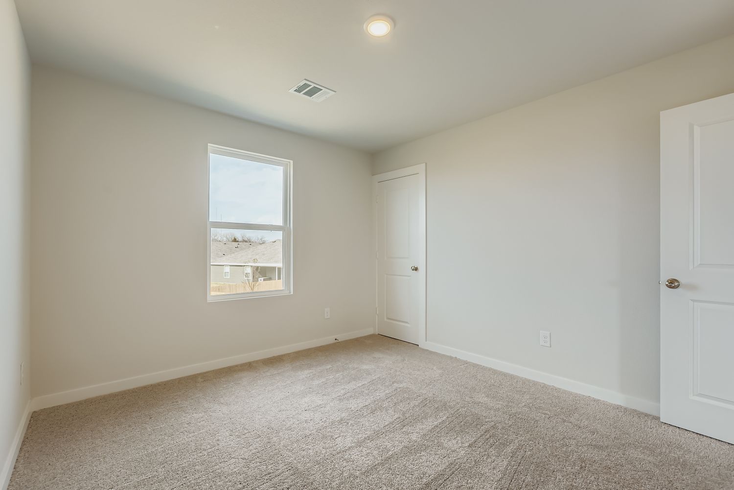 A room with white doors.