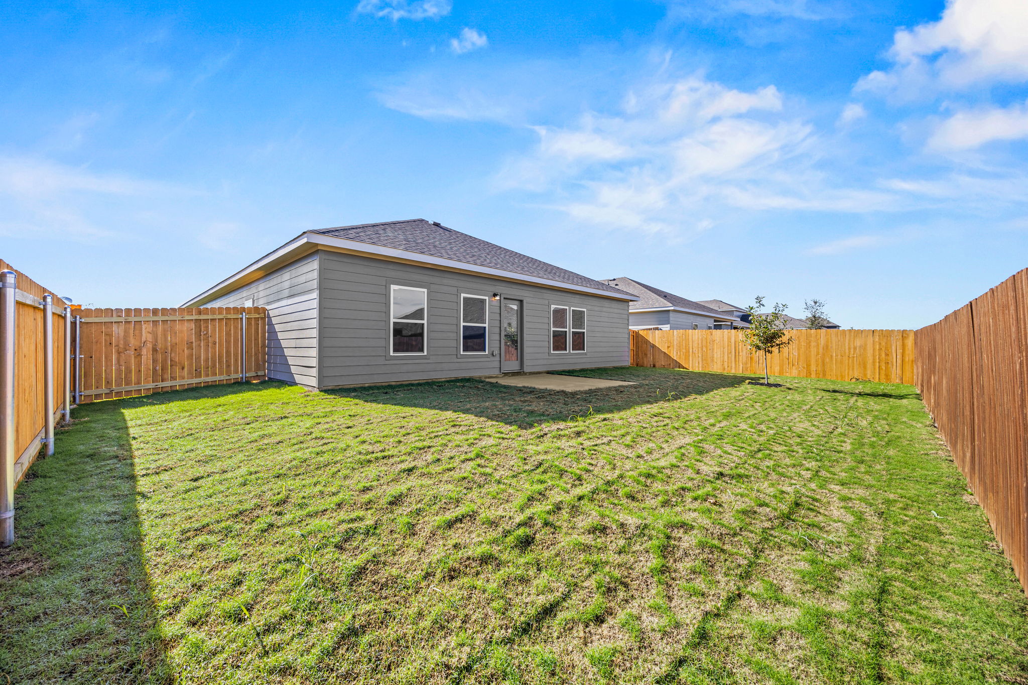 A house with a fence around it.