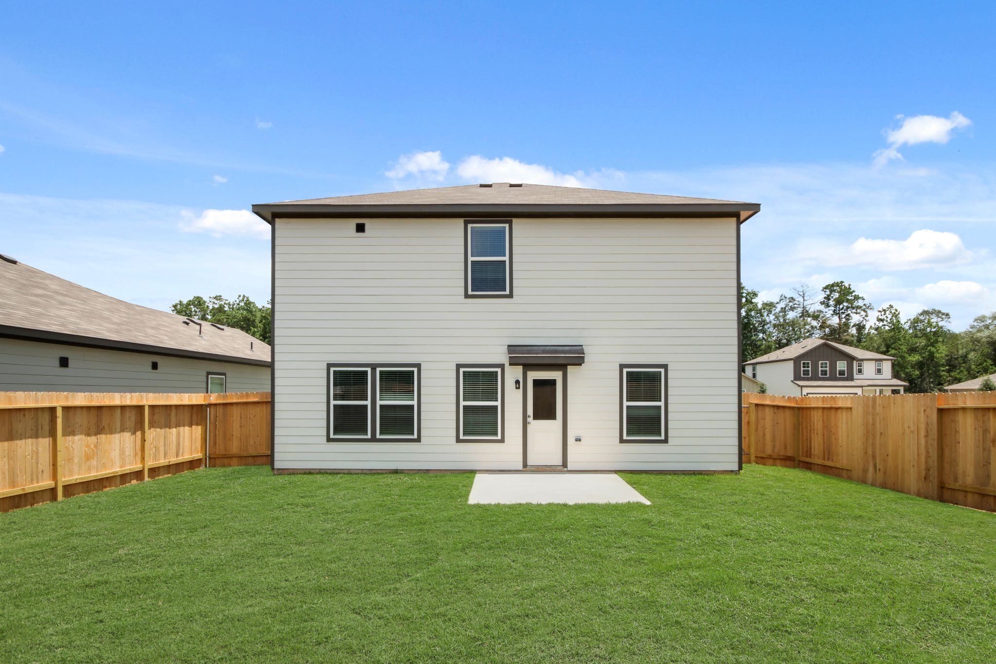 A house with a fence around it.