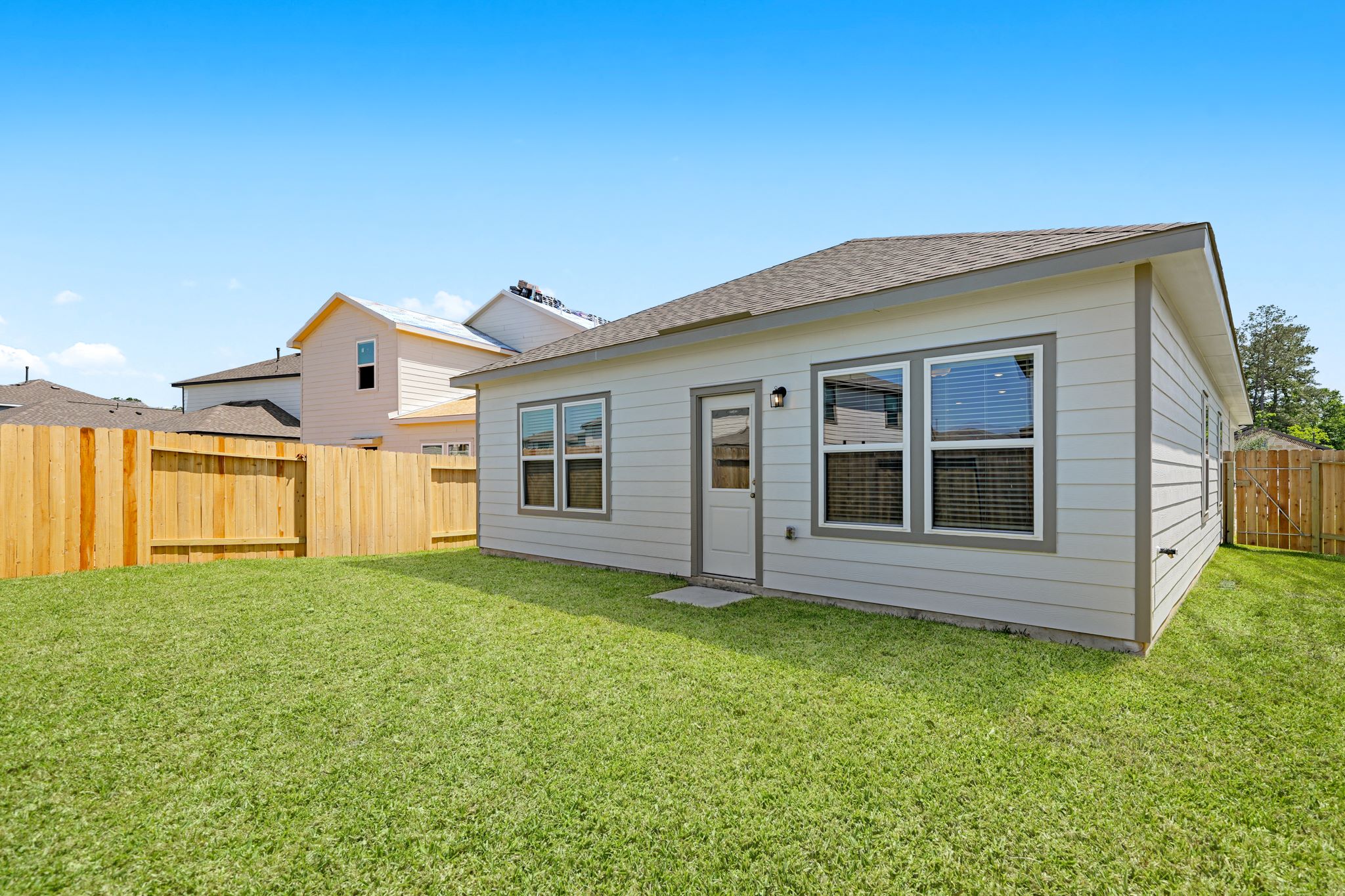 A house with a fence around it.