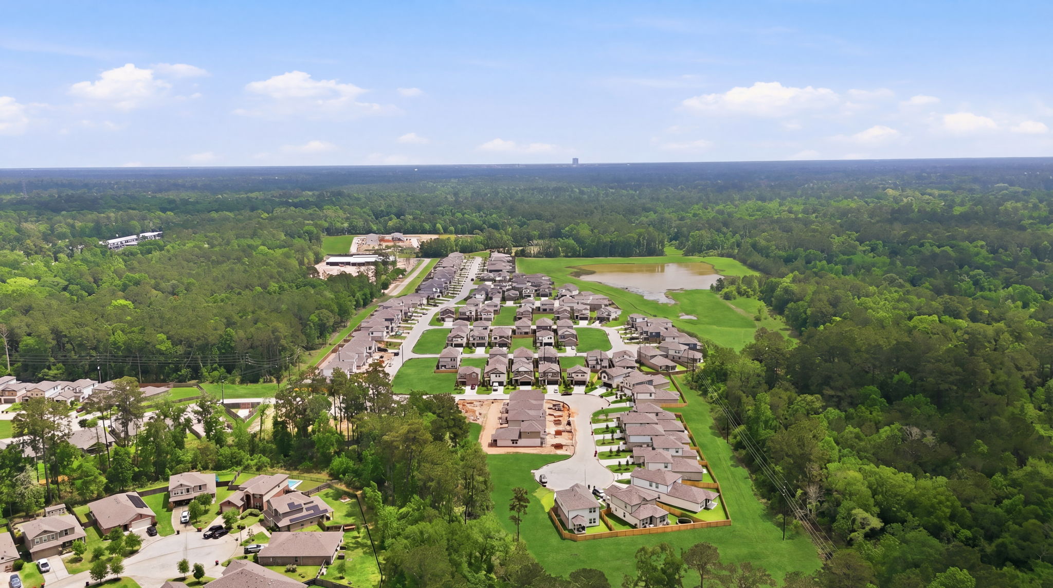 A landscape with trees and buildings.