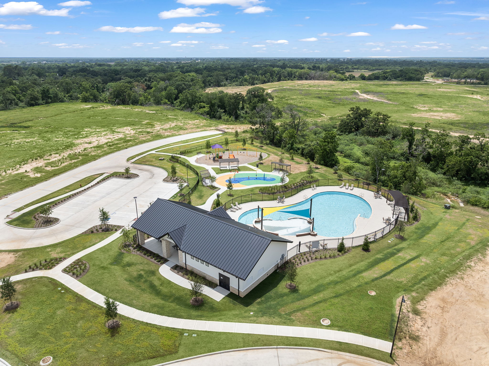 A swimming pool in a golf course.