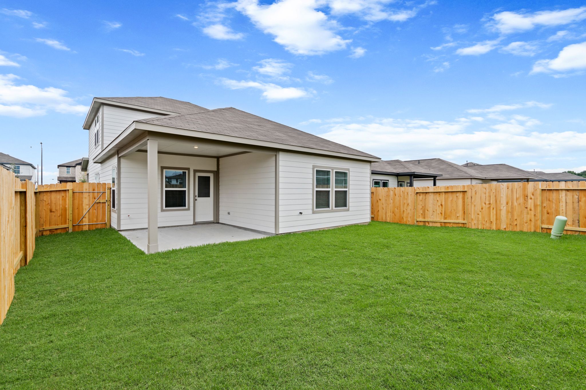 A house with a fence around it.