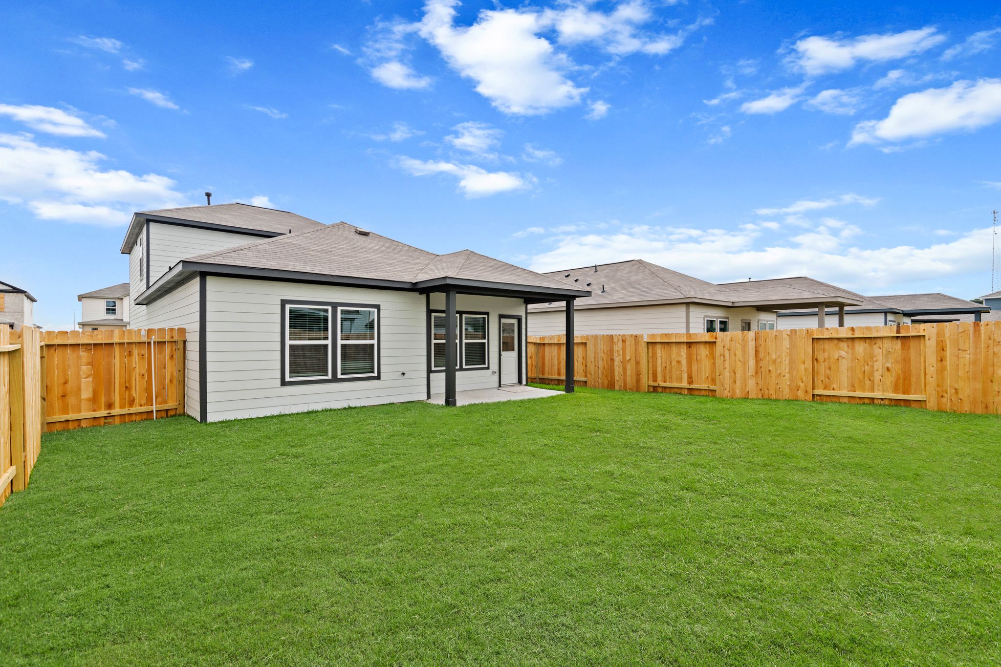 A house with a fence around it.