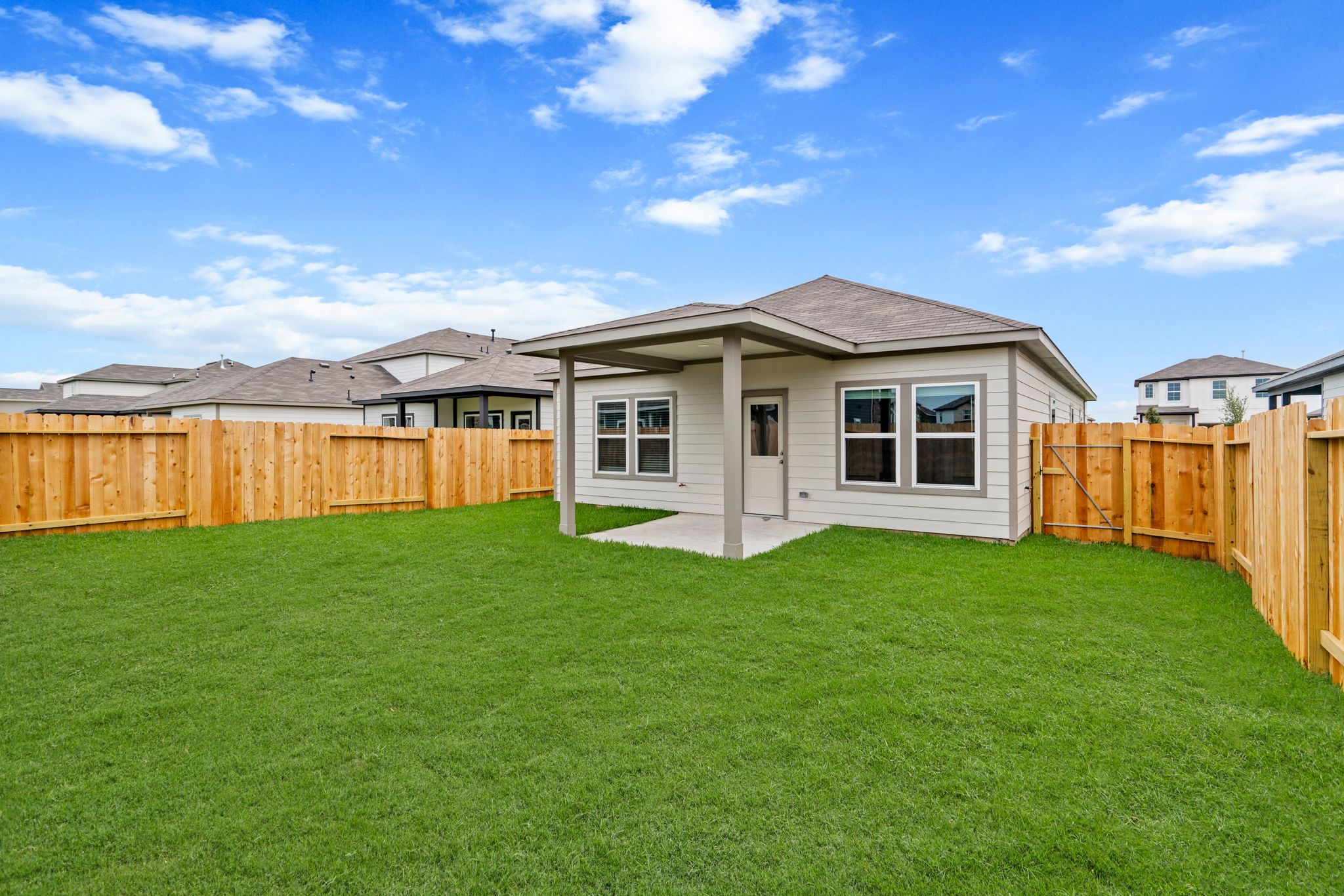 A house with a fence around it.