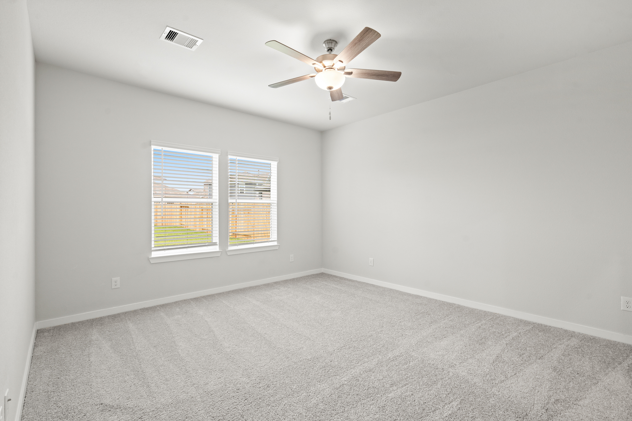 A ceiling fan in a room.