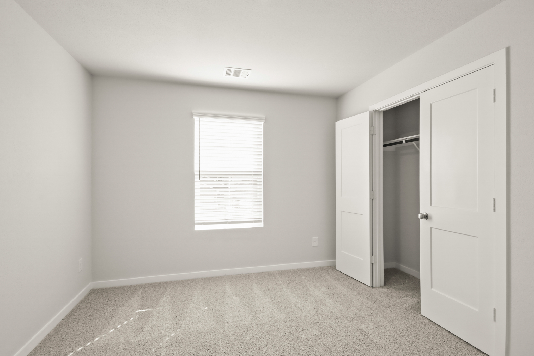 A room with white doors.
