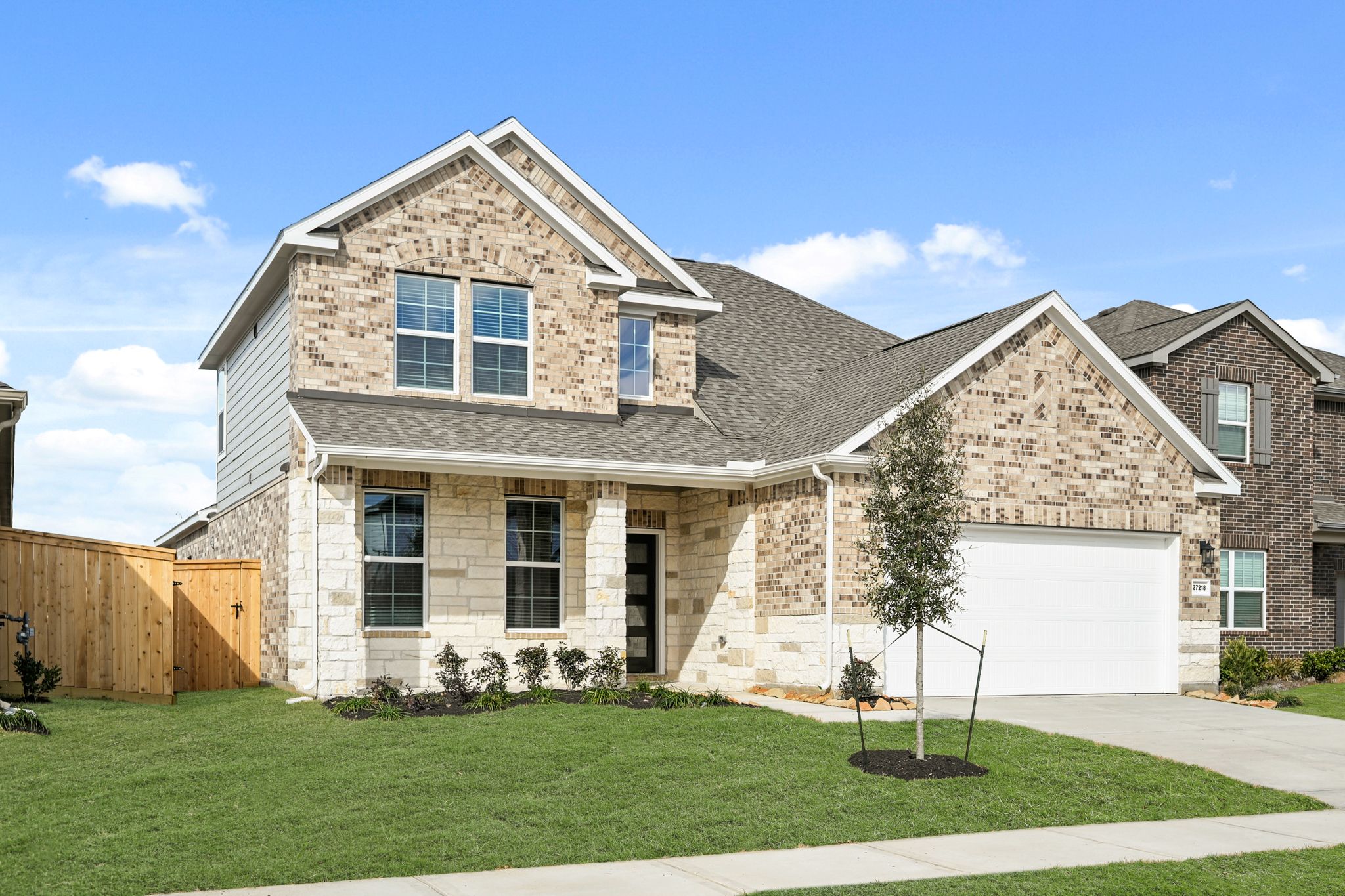 A house with a large front yard.