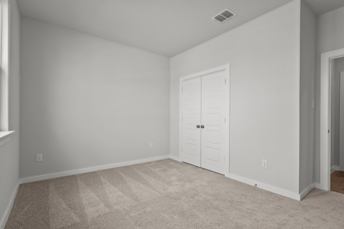 A room with white doors.