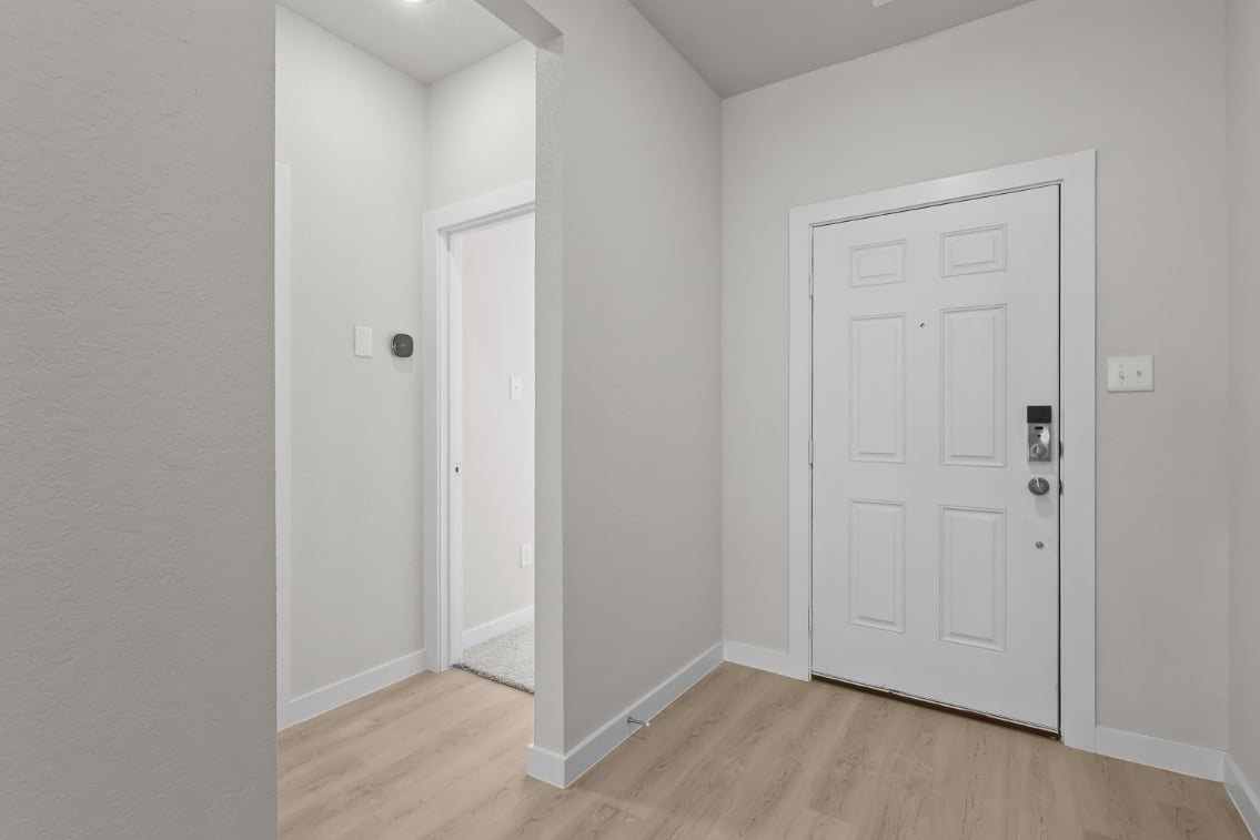 A room with white doors.