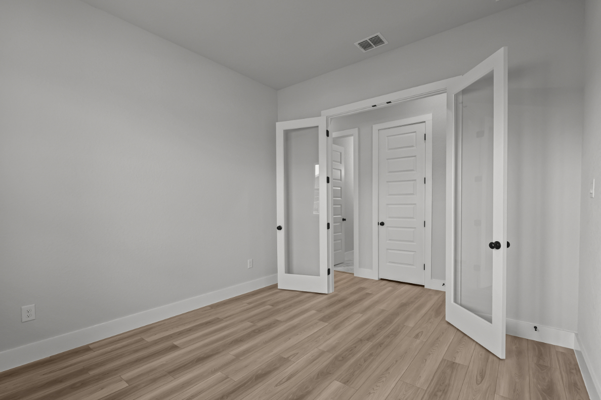 A room with white doors.