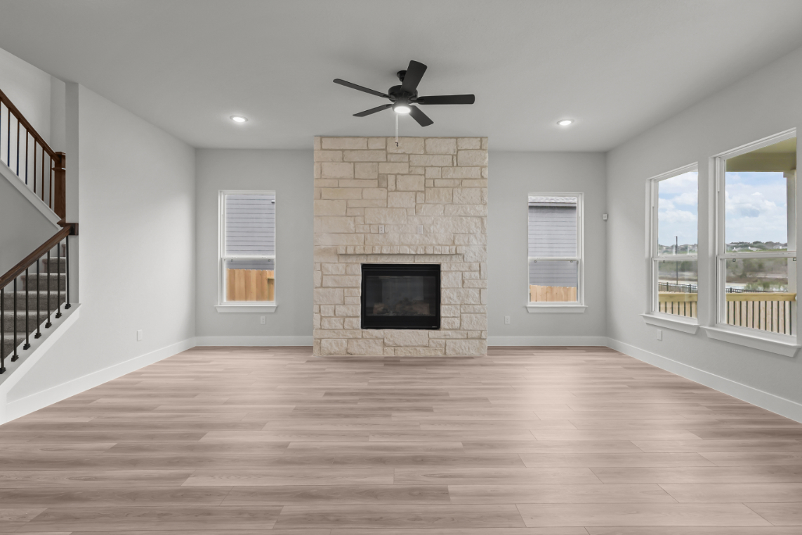 A living room with a fireplace.