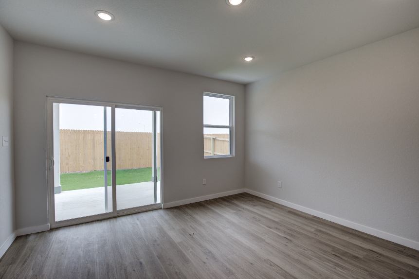 A room with a glass door.