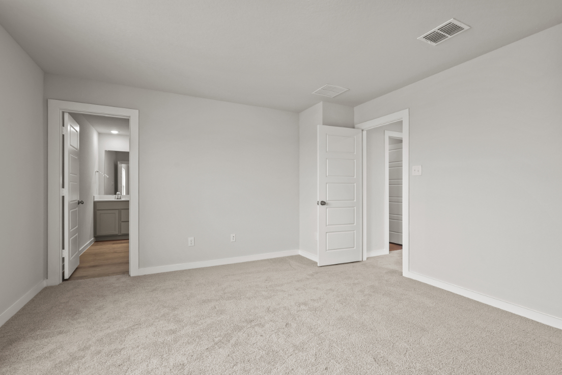 A room with white doors.
