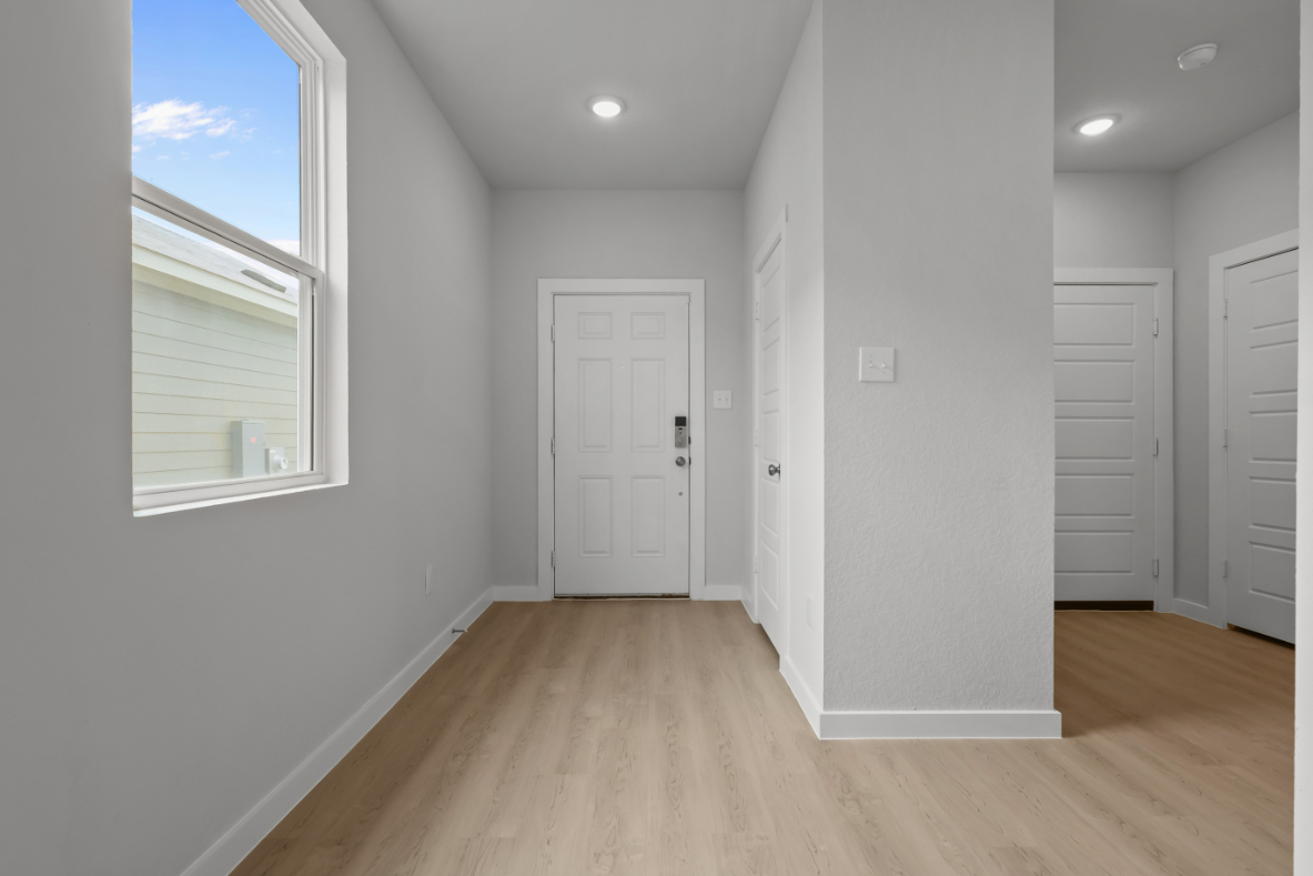 A room with white doors.