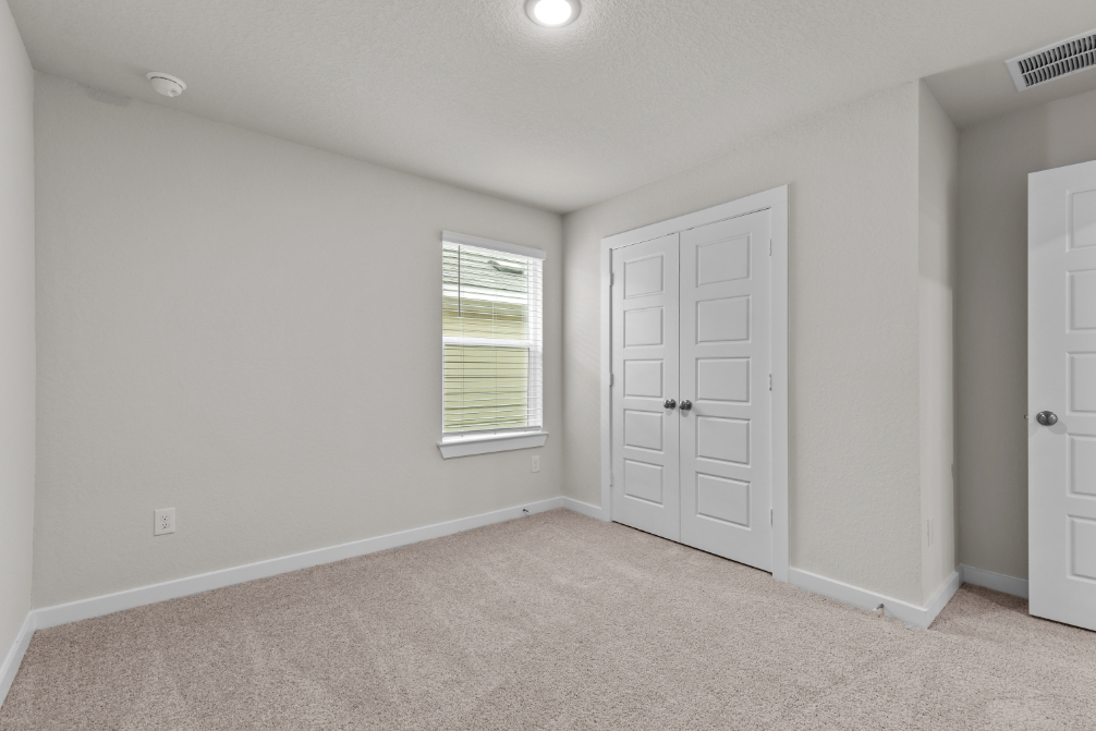 A room with white doors.