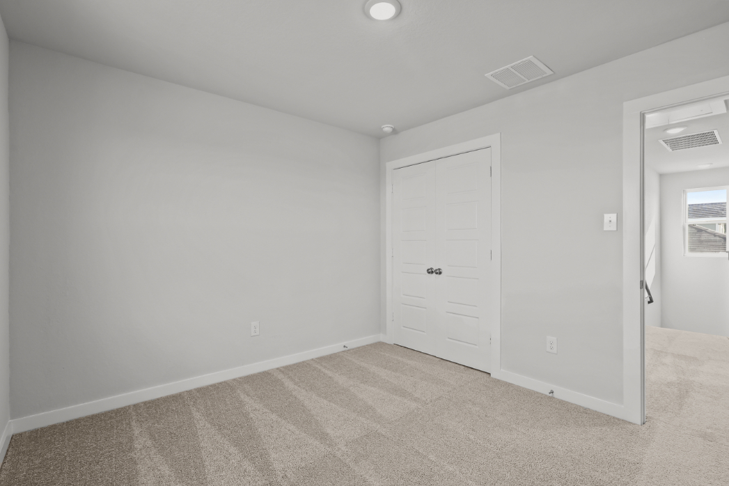 A room with white doors.