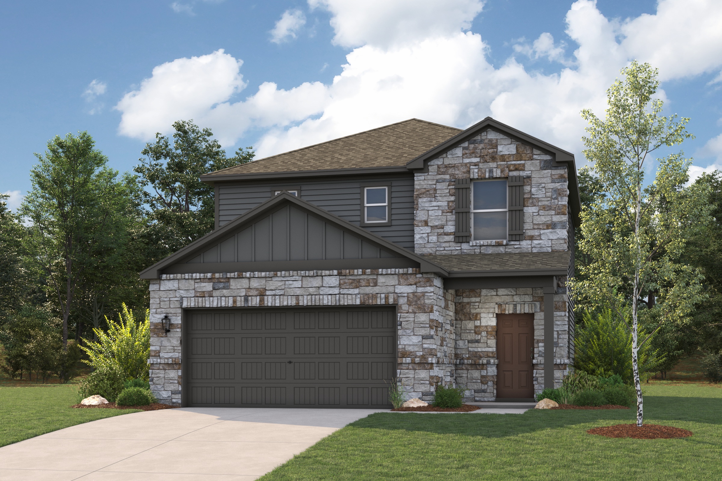 A stone house with a garage.