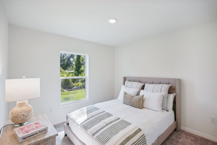 A bed in a room.