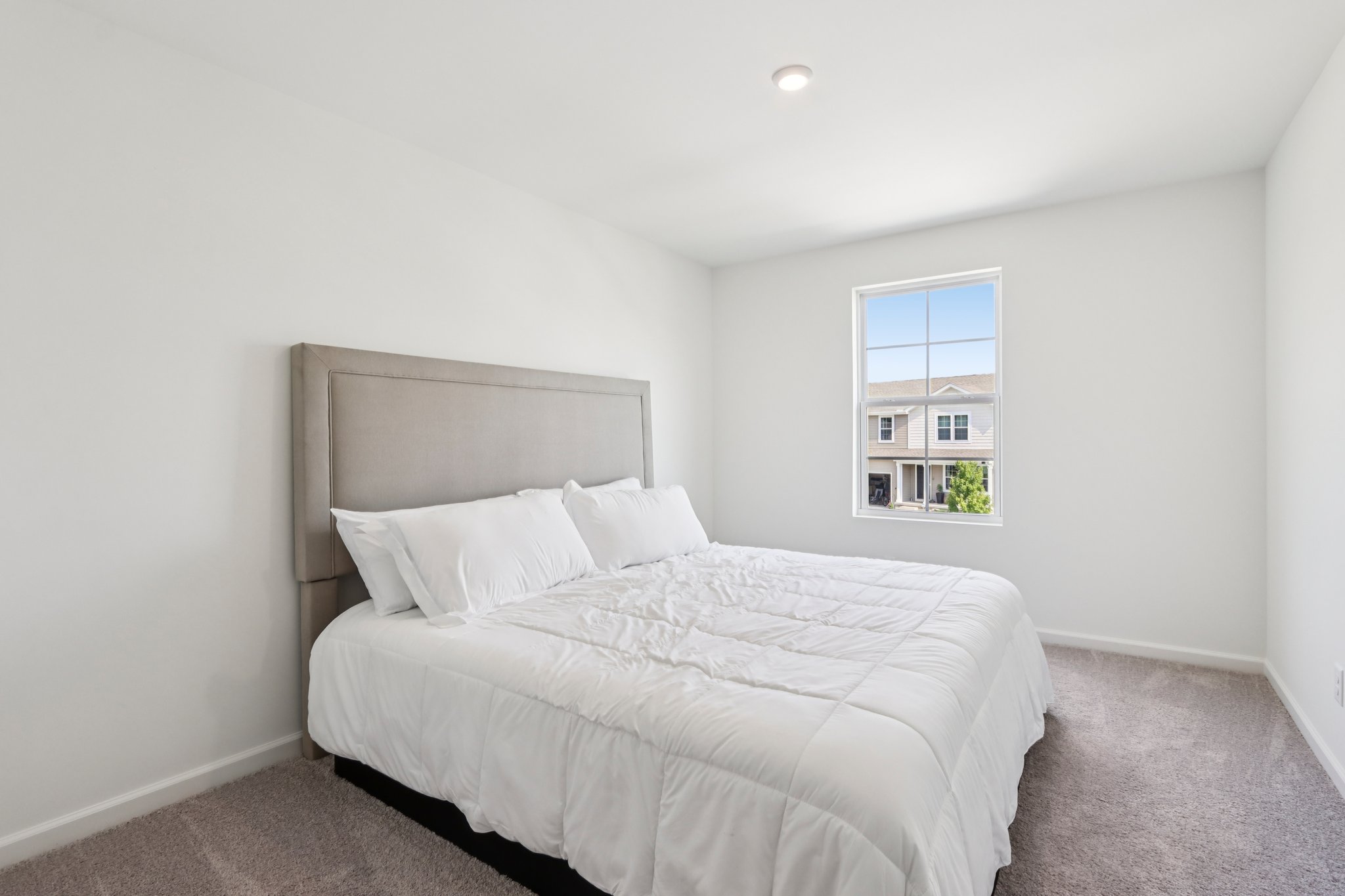 A bed in a room.
