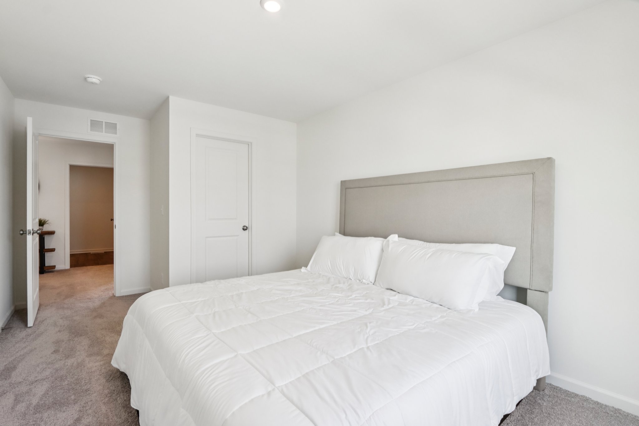 A bed in a room.